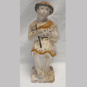 22-5689, Chalk figure of a woman holding a lamb and flag. $975