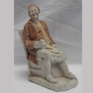 2-14408, Chalk figure of a seated gent holding ale mug. $595