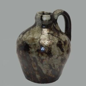 31-20555, Rare PA redware miniature oviod jug, having a grey, greenish maganese decoration. $2,950