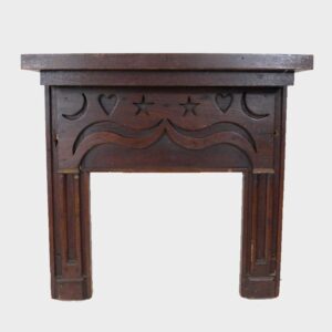 31-20550, Miniature walnut mantel, neat heart, stars and half moons, mid 19th century. $1,850