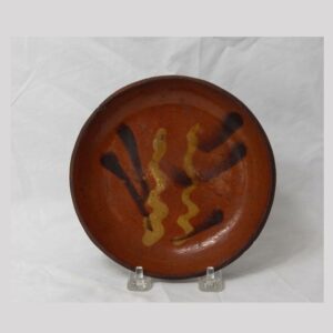 21-8511x, 6 1/2" redware plate 2 color slip decoration, Berks Co., PA. $1,950